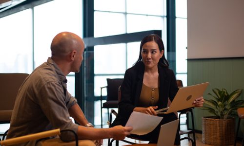 businesswoman-and-man-at-meeting-in-office-2025-04-03-16-27-17-utc 2